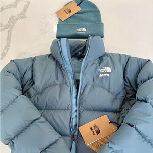 The North Face x Skims set in Kyanite (2000 Retro Nuptse Jacket XS & Beanie)